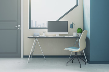 Minimalistic office with computer on table