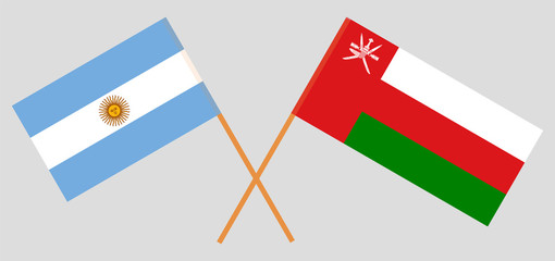 Crossed flags of Oman and Argentina