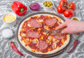 Hands prepare of neapolitan pizza, Ingredients for making neapolitan pizza. 