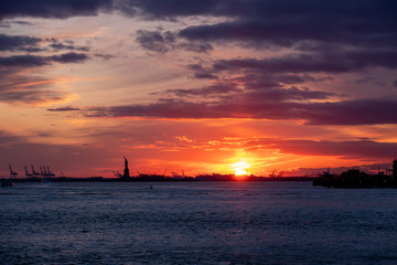 Winter Sunset view of Statue of Liberty and Upper New York Bay
