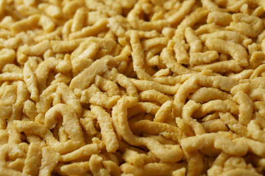 a pile of homemade swabian spaetzle pasta noodles