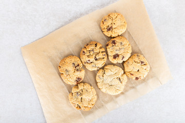 Homemade vanilla biscuits with chocolate chips made by kids