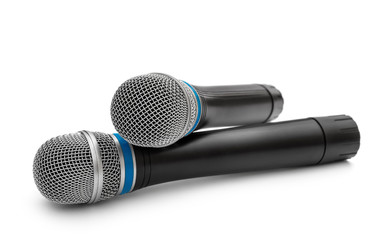Two microphones on a white background.