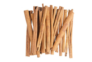 Cinnamon sticks top view isolated on white background with clipping path.