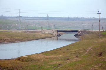 bridge and little river in the rustic area 