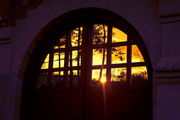 sunset reflection in the medieval gate 