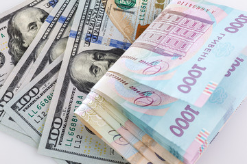 Fototapeta na wymiar Ukrainian money - hryvnia banknotes USA dollars bills. Finance in Ukraine, of the hryvnia to the dollar exchange rate. Close-up concept finance investment.