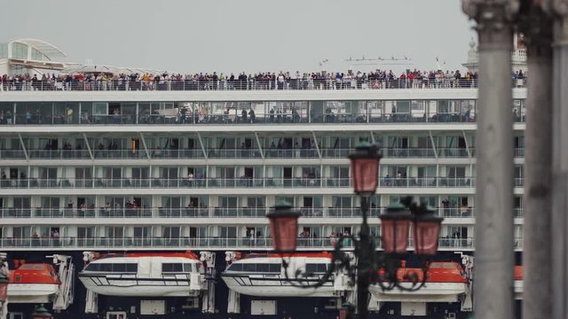 Large Cruise Ship sails along San Marco Canal past Piazzetta San Marco Square