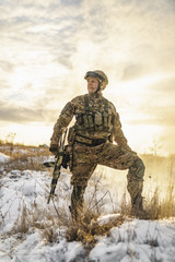 Ukrainian soldier after victory in battle with Russian. Winter battlefield near Kharkov Ukraine