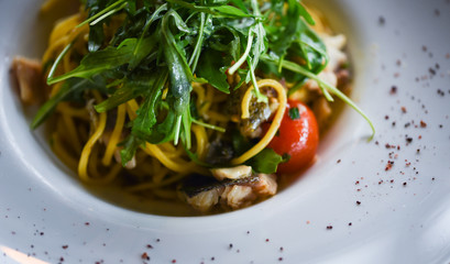 delicious fresh italian pasta with fish & rucola salad