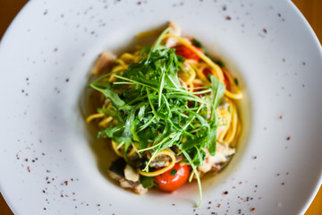 delicious fresh italian pasta with fish & rucola salad