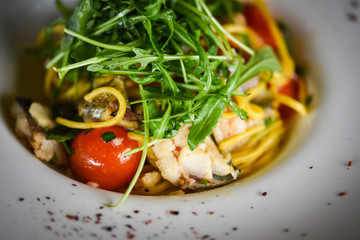 delicious fresh italian pasta with fish & rucola salad