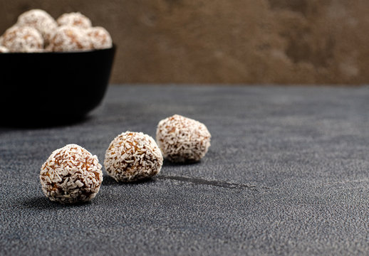 Energy balls close-up on a dark background with copy space, flat lay.