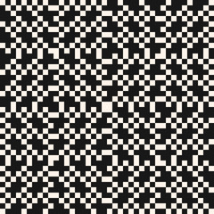 Fototapeta premium Vector seamless pattern. Traditional geometric folklore ornament. Monochrome ornamental texture of embroidery, knitting, jacquard. Simple background with small squares. Black and white design
