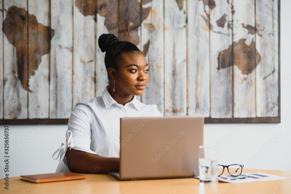 Wall mural successful african american business woman in modern office