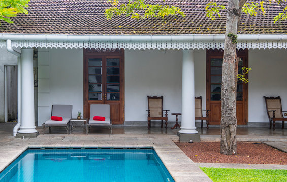 swimming pool in the court yard of a colonial style boutique hotel