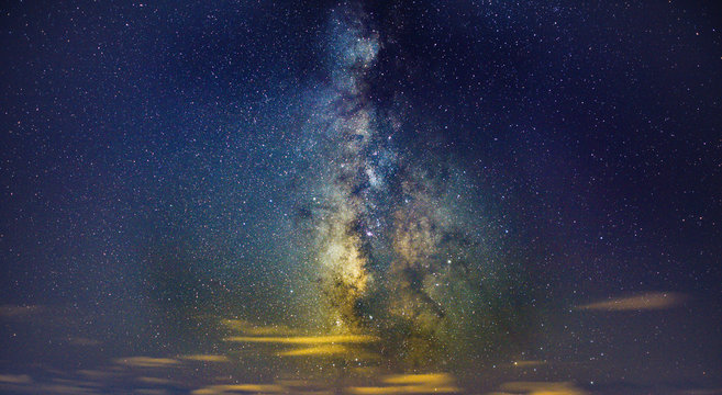 Clouds streak across the Milky Way