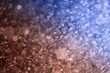 glitter bokeh of light background .Abstract blurred light.blue and red color