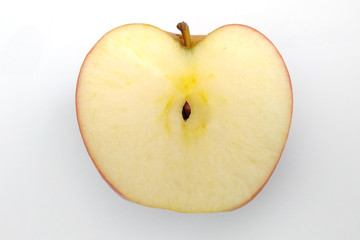 Half an apple on a white background top view. Fresh halved apple.