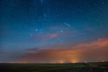 dramatic sky with clouds and meteorite