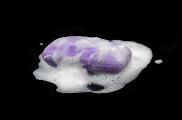 Soap bar with foam isolated on black  background. Wet bar of soap. Antivirus. Coronavirus (CoV). Fighting virus.