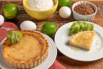 Homemade lemon pie with and a golden crust, on wooden background