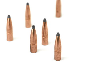 A rifle bullet. Hunting ammunition isolated on white.