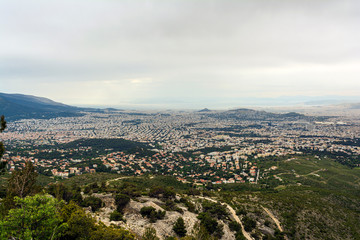 Fototapeta na wymiar Panoramic view of cloudy Athens, taken shot from Penteli mountain
