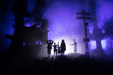 Two homeless little girl walking in destroyed city, soldiers and helicopters and tanks are still attacking the city