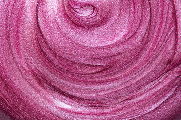 Fototapeta na wymiar Texture of lip gloss. Smudged pink lipgloss