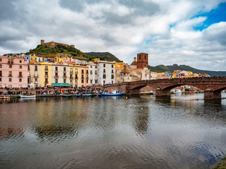 aerial view of bosa town with his colored houses and the castle in background
