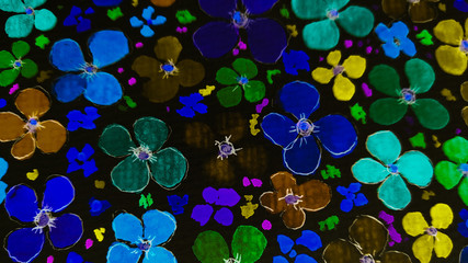 Watercolor meadow of rich flowers different colors on a black background
