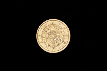 Portuguese 50 Euro Cent coin from 2009, obverse showing the royal seal of 1142. Isolated on black background