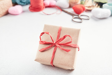 Set of eco presents laid out on the table. Zero waste gift wrapped in paper.