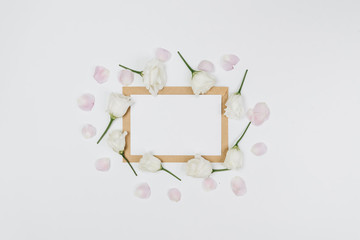 frame of roses and blank card