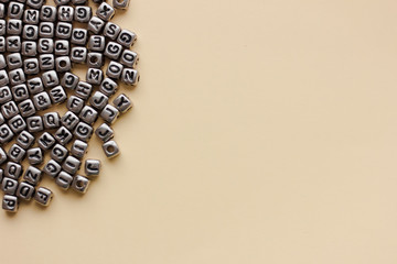 Abstract background with letter cubes. Empty space for text.