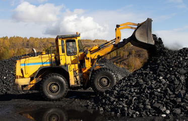 Obraz na płótnie Canvas Coal mine, mining equipment, hoist, conveyor belt, excavator.