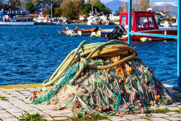 Pile of fishing nets and mooring lines at Fanari Port, Rhodope prefecture, Greece. Fishing tackle