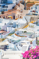 Traveling Concepts. Picturesque View of Beautiful and Colorful Houses of Greek Traditonal Oia or Ia Village at Santorini Island in Greece.