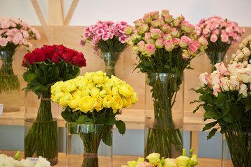 Blooming flowers in glass vase 