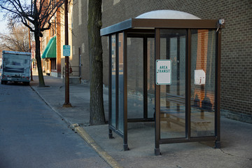 An empty bus stop shelter in Logansport Indiana