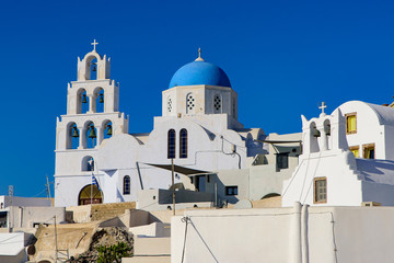 Blue domed church in Santorini, Greece