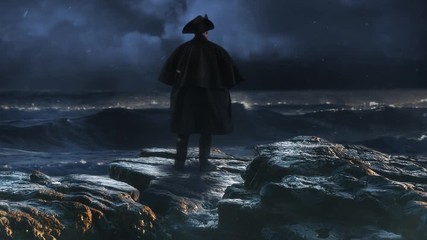 Man in Tri Corner Hat Looking Out to Sea 4K features a man in an eighteenth century hat a coat standing on the rocks looking out over a stormy ocean.