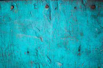 Madera azul con clavos