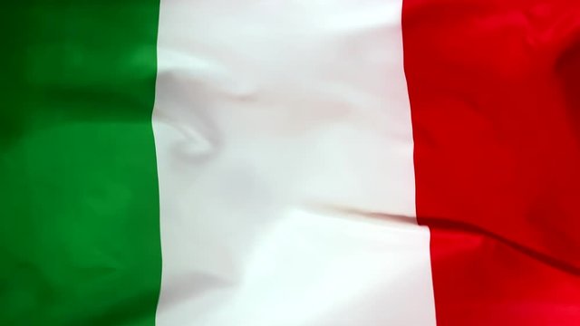 Italy flag waving in the wind close-up. The wind is blowing from right to left. Background for news, movies and more.