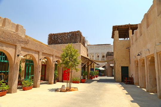 Old Dubai of buildings and traditional Arabian streets. Historical Al Fahidi neighborhood, Al Bastakiya in in Dubai.