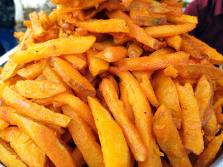 some yellow eatable food put on a shop