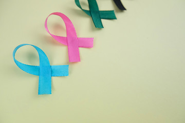 Different ribbons, symbols of cancer, cancer awareness month.  Copy space for your text.