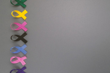 Different ribbons, symbols of cancer, cancer awareness month.  Copy space for your text.