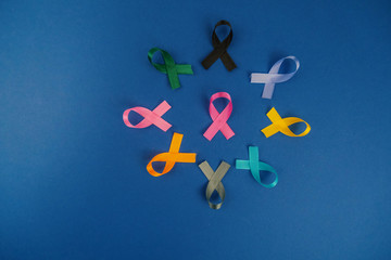 Different ribbons, symbols of cancer, cancer awareness month.  Copy space for your text.